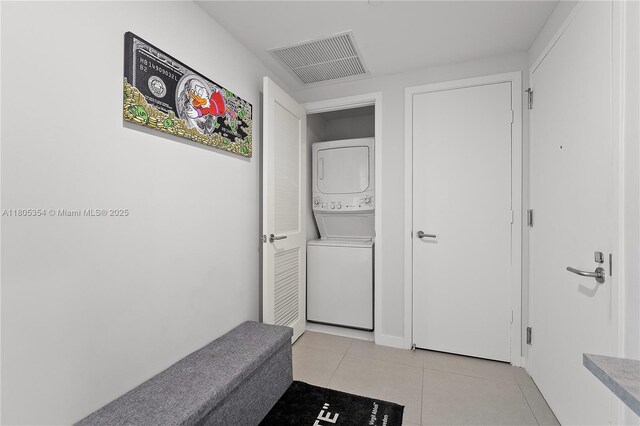 1100 S Miami Ave Unit 3210, Miami, FL 33130 - washroom with stacked washer / drying machine and light tile patterned floors