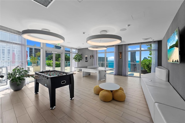 1100 S Miami Ave Unit 3210, Miami, FL 33130 - rec room with expansive windows and french doors