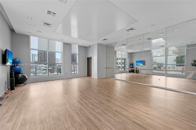 1100 S Miami Ave Unit 3210, Miami, FL 33130 - workout room with wood finished floors and healthy amount of natural light