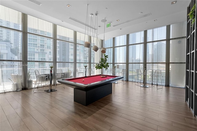 1100 S Miami Ave Unit 3210, Miami, FL 33130 - game room with floor to ceiling windows, pool table, a towering ceiling, and wood finished floors