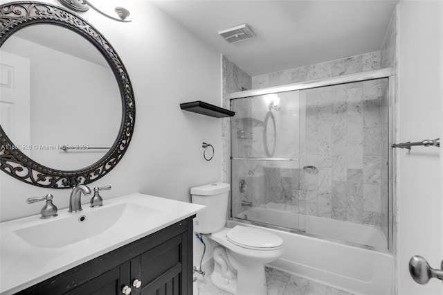 full bath with marble look tile flooring, toilet, vanity, and combined bath / shower with glass door