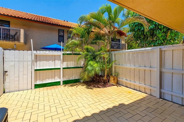 view of patio with fence