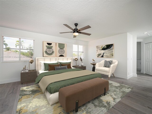 1128 Hidden Valley Way, Weston, FL 33327 - bedroom featuring baseboards, wood finished floors, a ceiling fan, and a textured ceiling