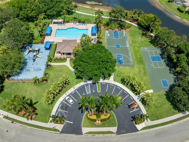 1128 Hidden Valley Way, Weston, FL 33327 - drone / aerial view of a pool area and a large body of water
