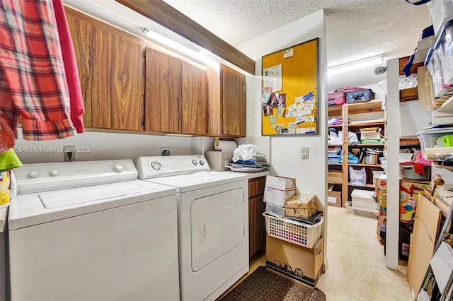 1510 Whitehall Dr Unit 402, Davie, FL 33324 - laundry room featuring independent washer and dryer, a textured ceiling, and cabinet space