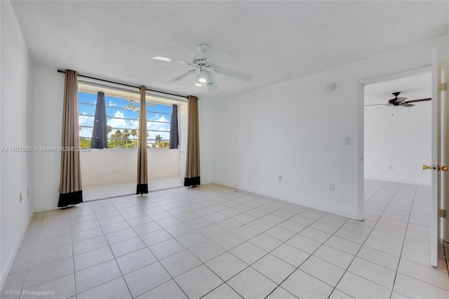 1551 NE Miami Gardens Dr Unit 322, Miami, FL 33179 - spare room featuring ceiling fan and light tile patterned flooring