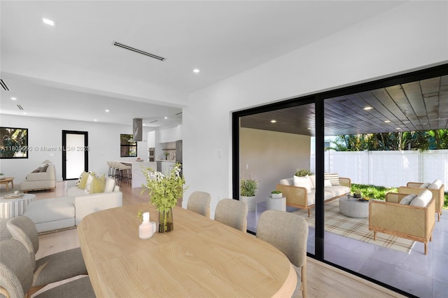 53 NW 107th St, Miami Shores, FL 33168 - dining area featuring plenty of natural light, light wood finished floors, and recessed lighting