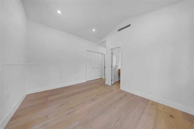 53 NW 107th St, Miami Shores, FL 33168 - unfurnished room featuring vaulted ceiling, light wood-style flooring, and recessed lighting