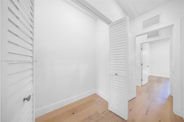 53 NW 107th St, Miami Shores, FL 33168 - hall with light wood-style floors and baseboards