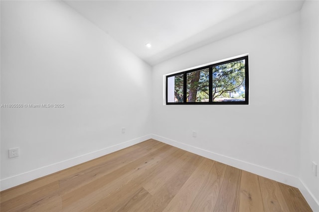 53 NW 107th St, Miami Shores, FL 33168 - unfurnished room featuring light wood-style floors, vaulted ceiling, and recessed lighting