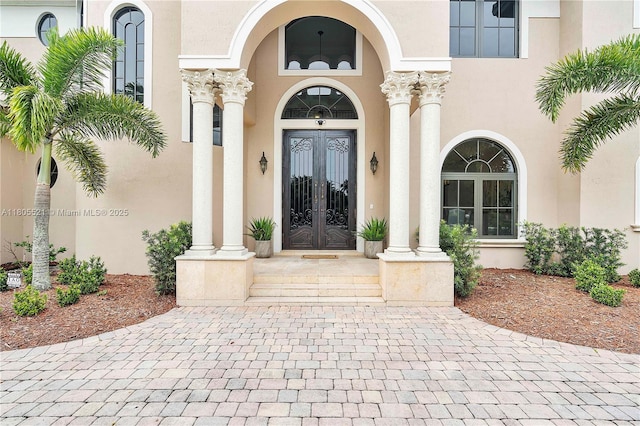 11930 NW 8th St, Plantation, FL 33325 - property entrance featuring french doors and stucco siding