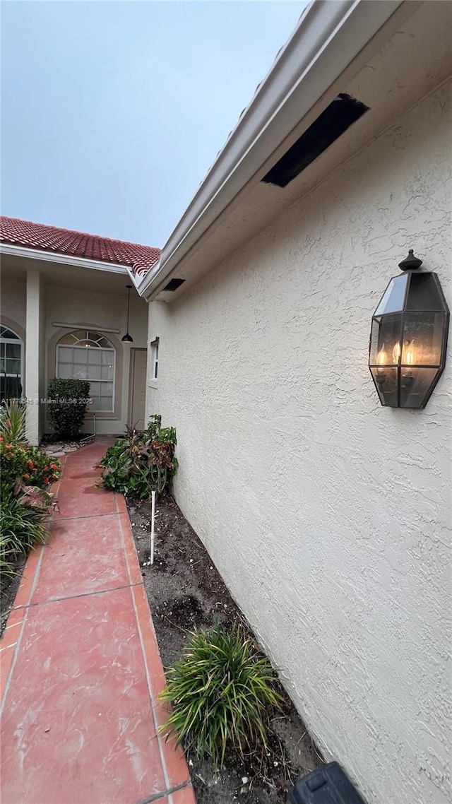 2615 Spiceberry Ln Unit 2625, Boynton Beach, FL 33436 - view of property exterior featuring stucco siding