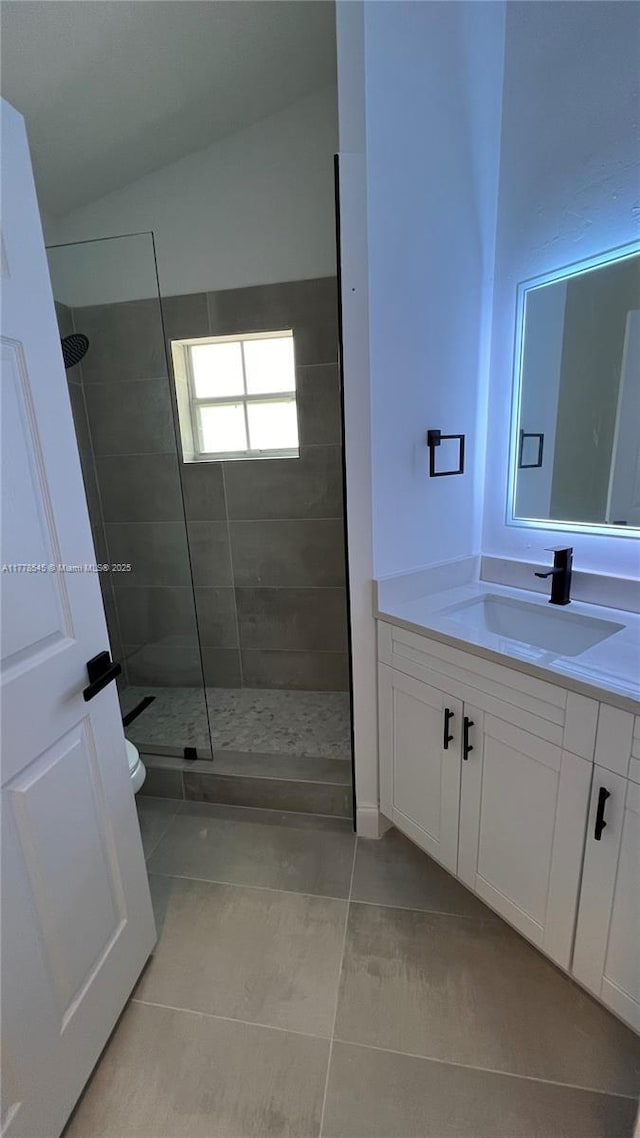 2615 Spiceberry Ln Unit 2625, Boynton Beach, FL 33436 - bathroom featuring a walk in shower, vanity, and tile patterned floors