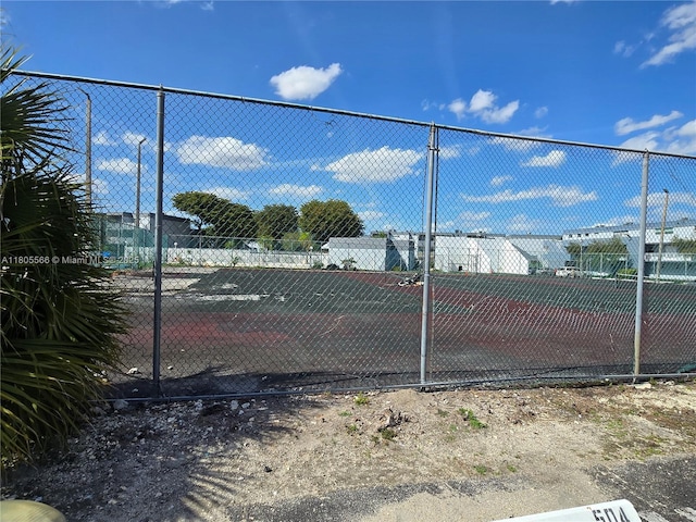 9375 Fontainebleau Blvd Unit L433, Miami, FL 33172 - view of tennis court featuring fence