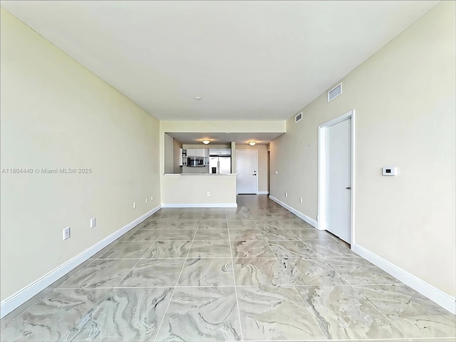 601 NE 36th St Unit 2608, Miami, FL 33137 - unfurnished living room with baseboards and light marble finish floors