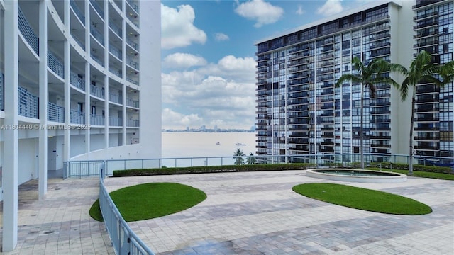 601 NE 36th St Unit 2608, Miami, FL 33137 - view of community featuring a water view and fence