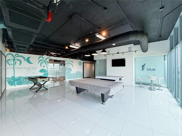 601 NE 36th St Unit 2608, Miami, FL 33137 - playroom featuring tile patterned floors, billiards, and baseboards