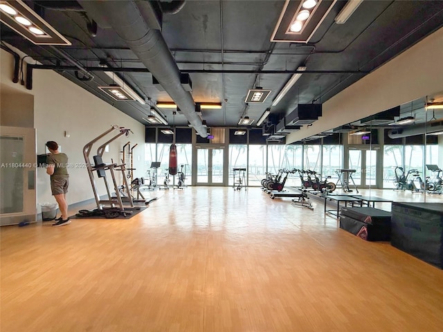 601 NE 36th St Unit 2608, Miami, FL 33137 - workout area with wood finished floors and healthy amount of natural light
