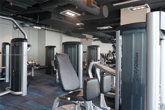 601 NE 36th St Unit 2608, Miami, FL 33137 - gym with dark carpet