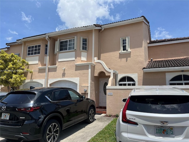 3901 SW 153rd Ct, Miami, FL 33185 - townhome / multi-family property with stucco siding and a tiled roof