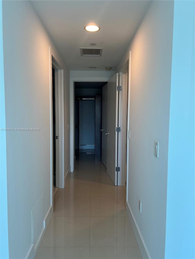 2950 NE 188th St Unit 444, Aventura, FL 33180 - corridor featuring light tile patterned floors, recessed lighting, and baseboards