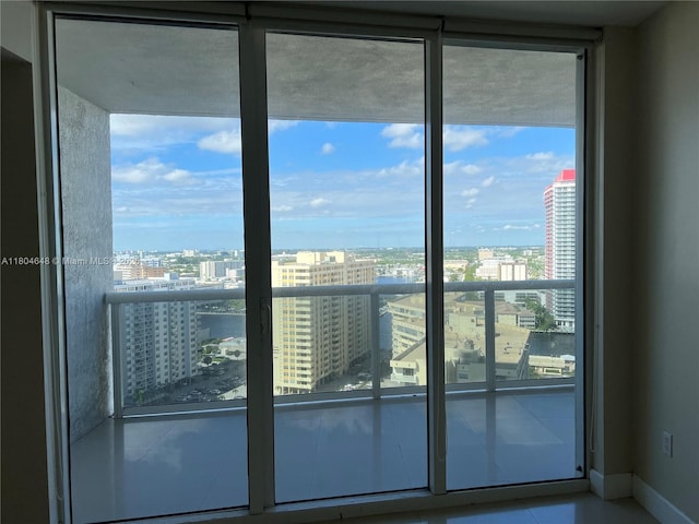 1800 S Ocean Dr Unit 2006, Hallandale Beach, FL 33009 - doorway with a view of city, healthy amount of natural light, and baseboards