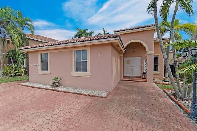 16401 SW 94th St, Miami, FL 33196 - mediterranean / spanish home with stucco siding and a tile roof