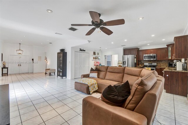 16401 SW 94th St, Miami, FL 33196 - living room with light tile patterned floors, ceiling fan, and recessed lighting