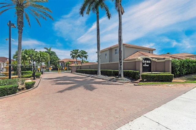 16401 SW 94th St, Miami, FL 33196 - view of home's community with a gate, fence, and a residential view
