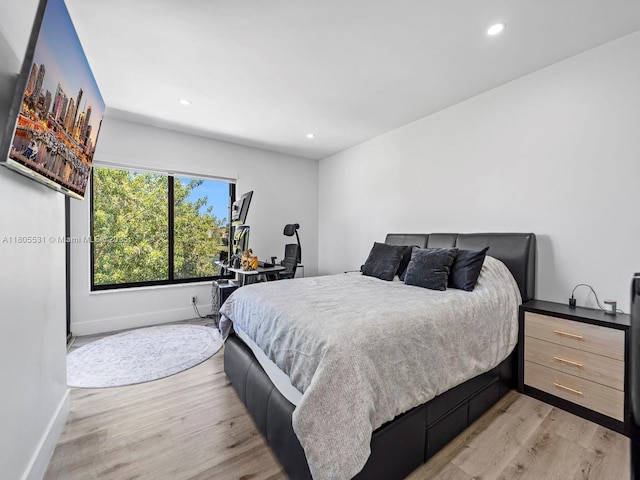 452 NW 97th Pl Unit 452, Miami, FL 33172 - bedroom featuring light wood-type flooring, baseboards, and recessed lighting