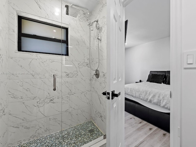 452 NW 97th Pl Unit 452, Miami, FL 33172 - full bath with ensuite bath, a stall shower, and wood finished floors