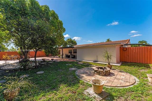 9875 SW 26th Ter, Miami, FL 33165 - view of yard featuring a fire pit and a patio