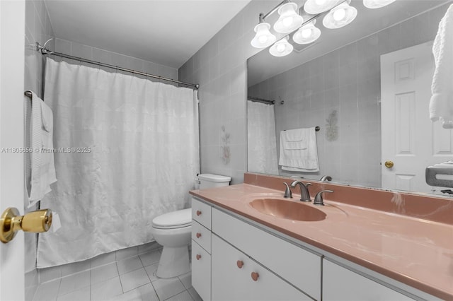 9875 SW 26th Ter, Miami, FL 33165 - bathroom with toilet, tile patterned floors, vanity, tile walls, and a shower with curtain