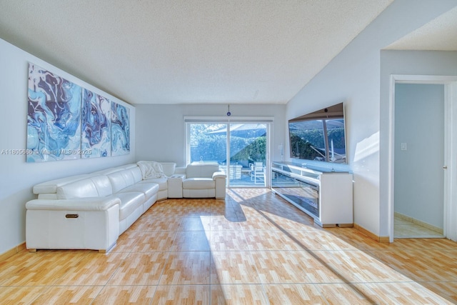 6755 NW 199th St, Hialeah, FL 33015 - living area featuring a textured ceiling, wood finished floors, and baseboards
