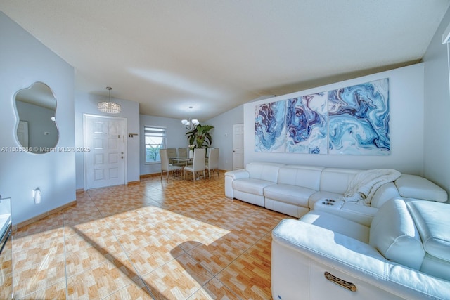 6755 NW 199th St, Hialeah, FL 33015 - living area with vaulted ceiling, baseboards, light tile patterned floors, and a chandelier