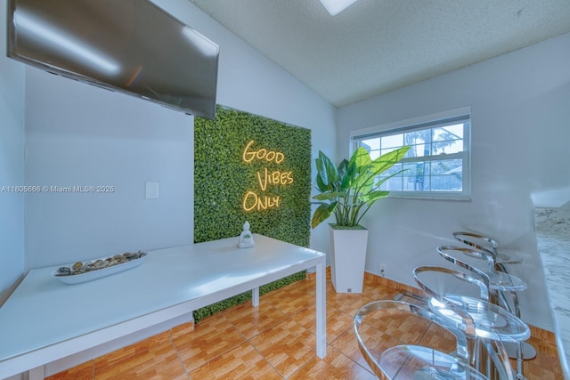 6755 NW 199th St, Hialeah, FL 33015 - office area with lofted ceiling and a textured ceiling