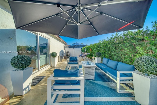 6755 NW 199th St, Hialeah, FL 33015 - view of patio featuring outdoor lounge area
