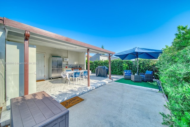6755 NW 199th St, Hialeah, FL 33015 - view of patio featuring outdoor dining space and grilling area