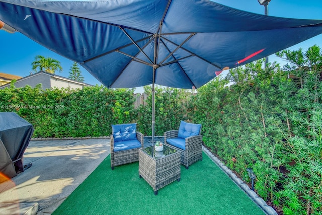 6755 NW 199th St, Hialeah, FL 33015 - fenced backyard featuring a patio and an outdoor living space