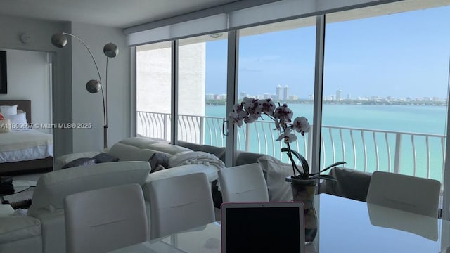 7601 E Treasure Dr Unit 1622, North Bay Village, FL 33141 - living room featuring a water view and a city view