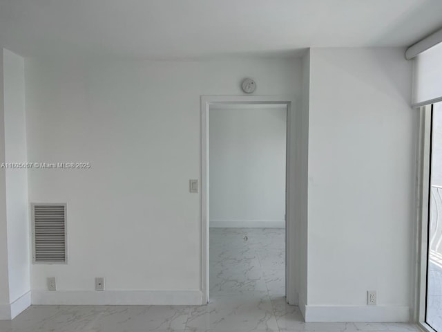 7601 E Treasure Dr Unit 1622, North Bay Village, FL 33141 - spare room with light marble finish floors and baseboards