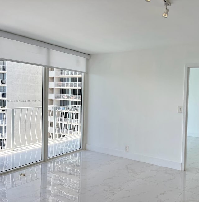7601 E Treasure Dr Unit 1622, North Bay Village, FL 33141 - unfurnished room with baseboards and marble finish flooring