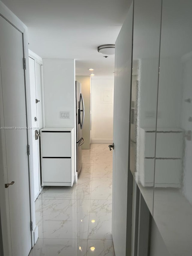 7601 E Treasure Dr Unit 1622, North Bay Village, FL 33141 - corridor with light marble finish floors