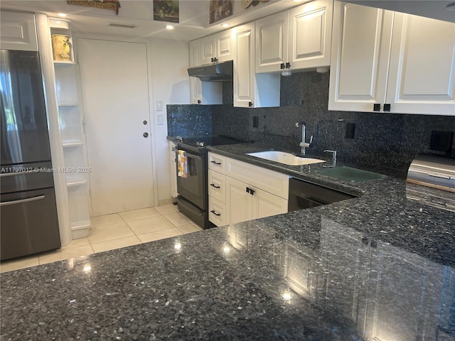 400 Diplomat Pkwy Unit 611, Hallandale Beach, FL 33009 - kitchen featuring freestanding refrigerator, electric range, under cabinet range hood, a sink, and dark stone countertops