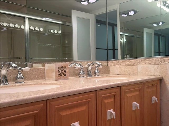 400 Diplomat Pkwy Unit 611, Hallandale Beach, FL 33009 - bathroom with double vanity, a shower stall, and decorative backsplash