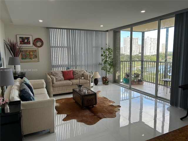 20335 W Country Club Dr Unit 903, Aventura, FL 33180 - living area with expansive windows, recessed lighting, and tile patterned flooring