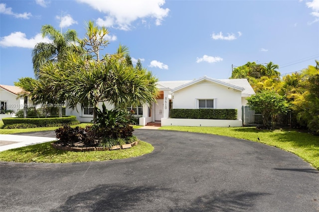8610 SW 83rd St, Miami, FL 33143 - view of front of home featuring curved driveway and stucco siding