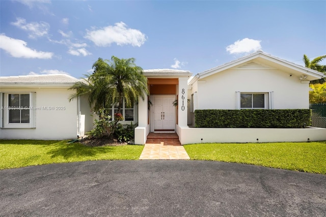 8610 SW 83rd St, Miami, FL 33143 - single story home featuring stucco siding and a front lawn