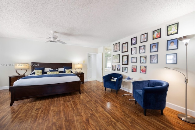 8610 SW 83rd St, Miami, FL 33143 - bedroom featuring wood finished floors, a textured ceiling, baseboards, and a ceiling fan