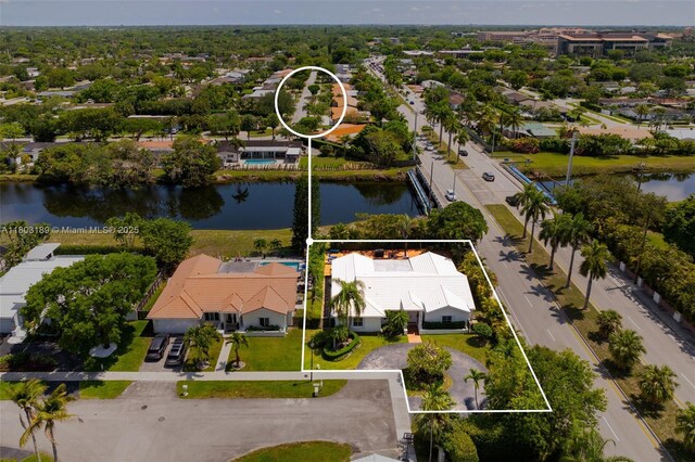 8610 SW 83rd St, Miami, FL 33143 - aerial perspective of suburban area featuring property parcel outlined and a nearby body of water